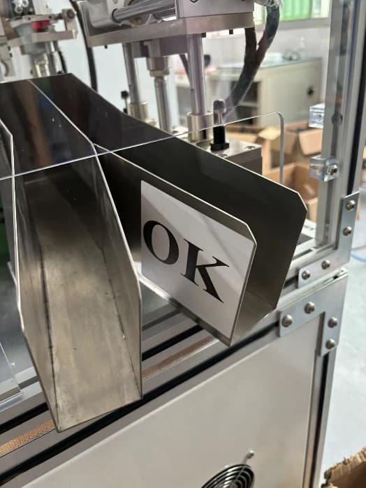 automatic-ok-ng-sorting-system.jpg Automatic OK and NG sorting system for assembled filter components after vision inspection