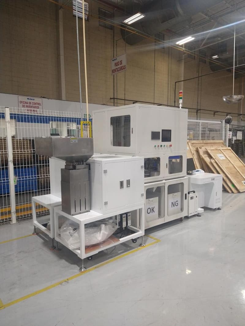 ultrasonic-welding-automation-line-installed-at-customer-site.jpg Custom end cap and felt ultrasonic welding automation line installed at customer's production facility