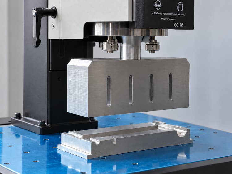 15kHz ultrasonic welding test on a plastic part with custom horn and fixture